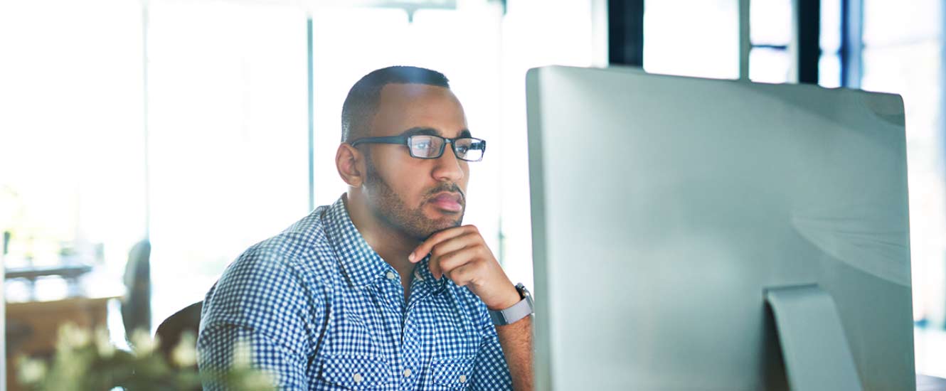 Young person checking their account online.